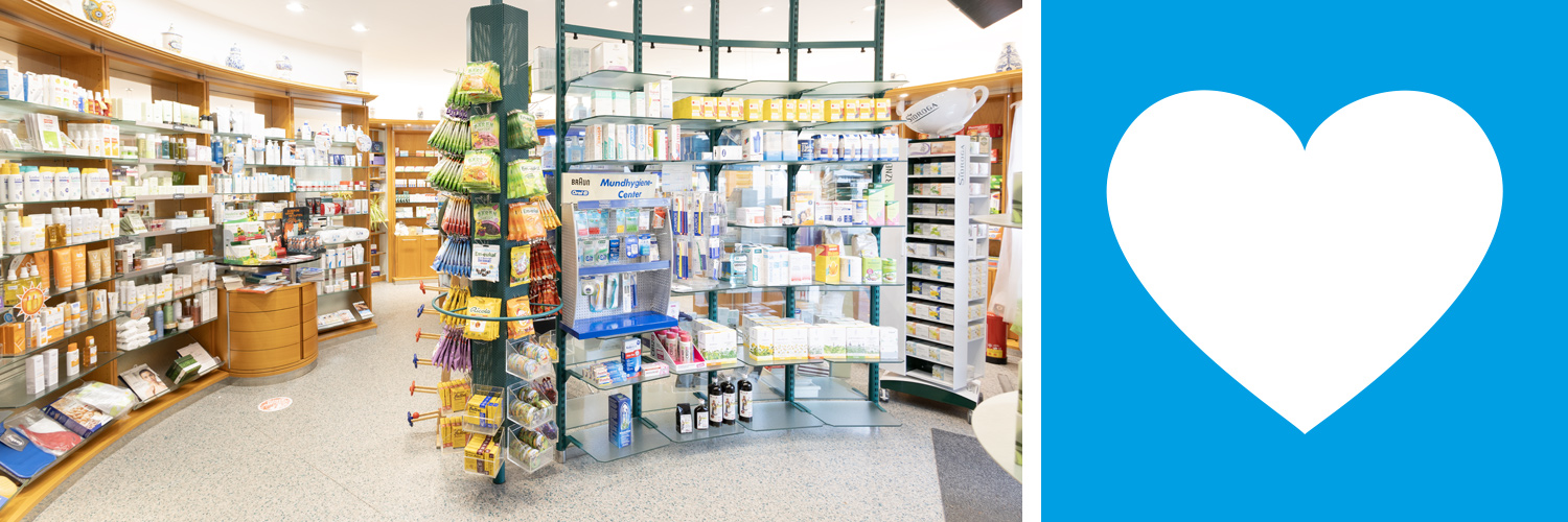 Innenraum einer Apotheke mit Regalen voller Arzneimittel und einer Verkaufstheke im Vordergrund.